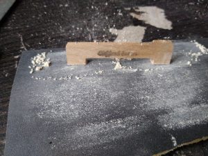Sanding the bridge