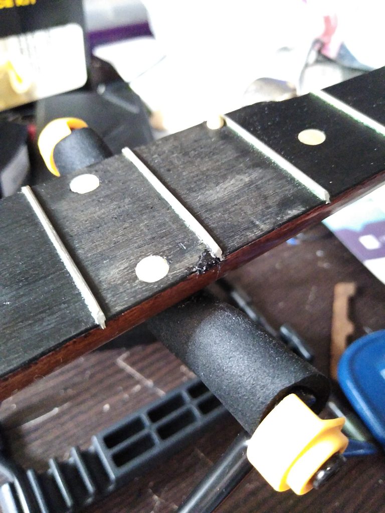 Sixth fret unfinished